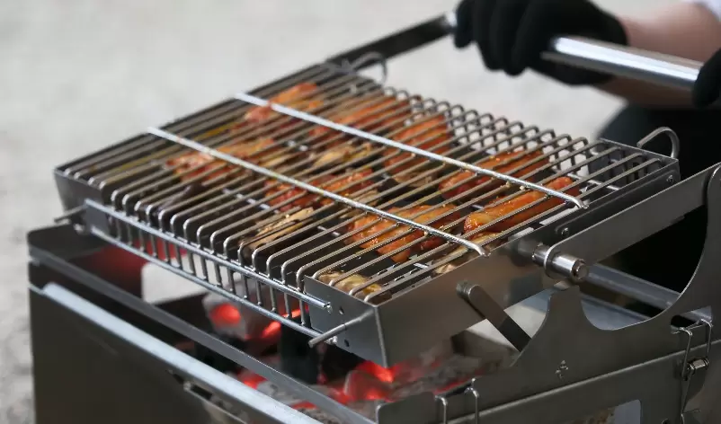 Griglia girevole per barbecue
