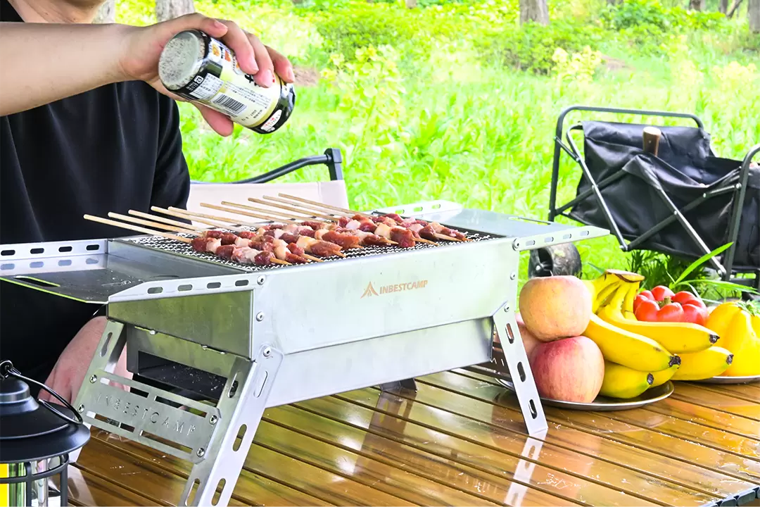 Barbecue a carbone in acciaio inox con manico pieghevole