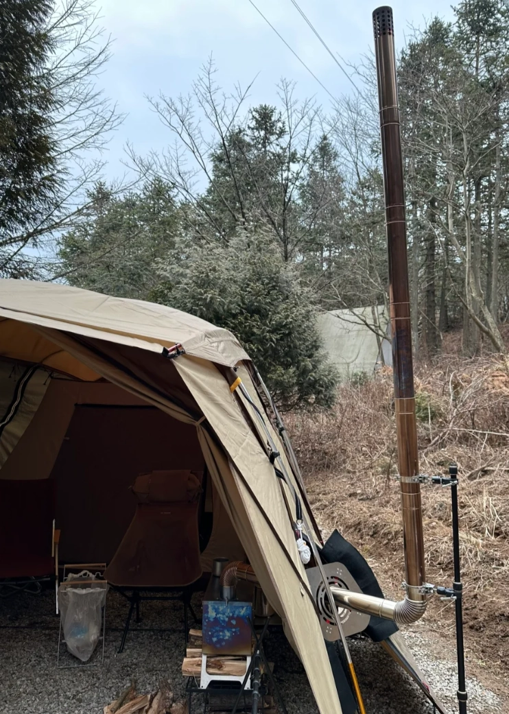 Come installare un tubo di scarico su una stufa in tela