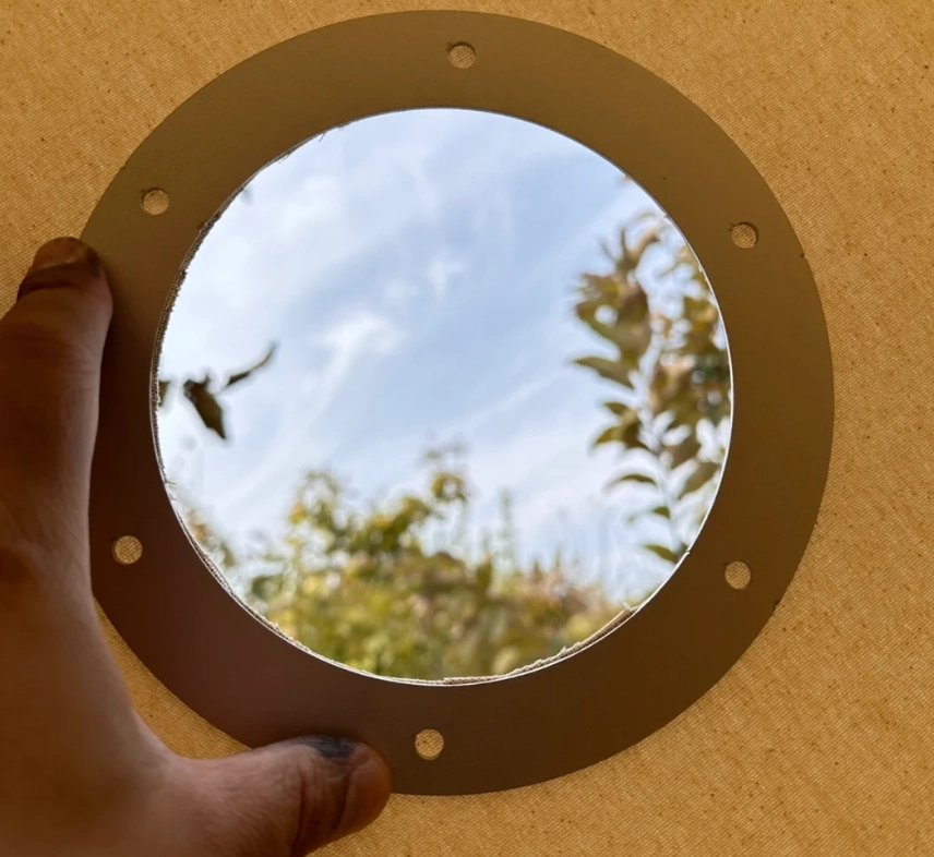 Come installare un tubo di scarico su una stufa in tela