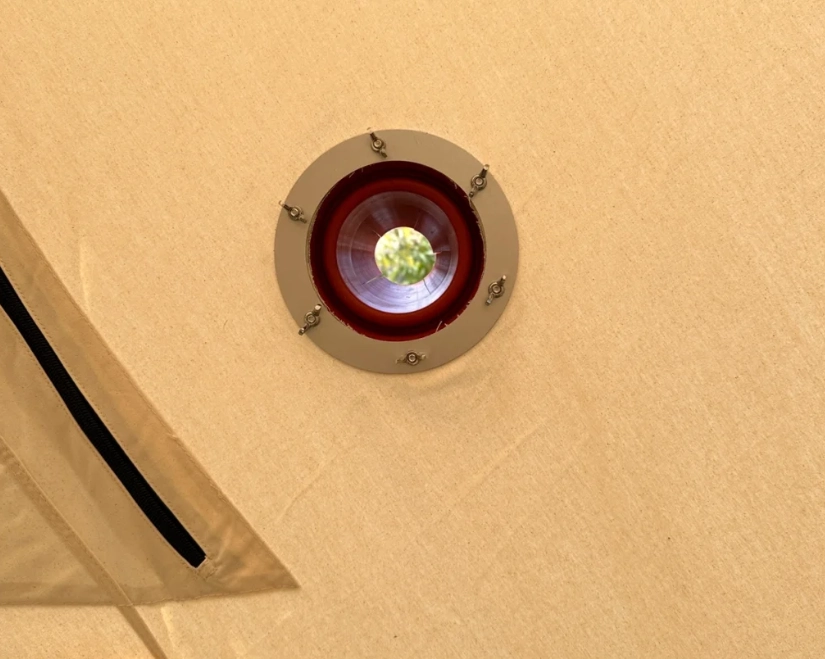 Come installare un tubo di scarico su una stufa in tela